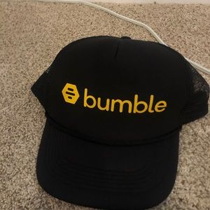 Black bumble trucker hat